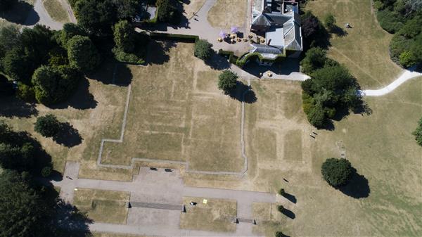 Aerial view of mansion site and parchmarks, July 2018 © National Trust