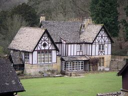 The west facade of the 19th century shooting lodge © National Trust